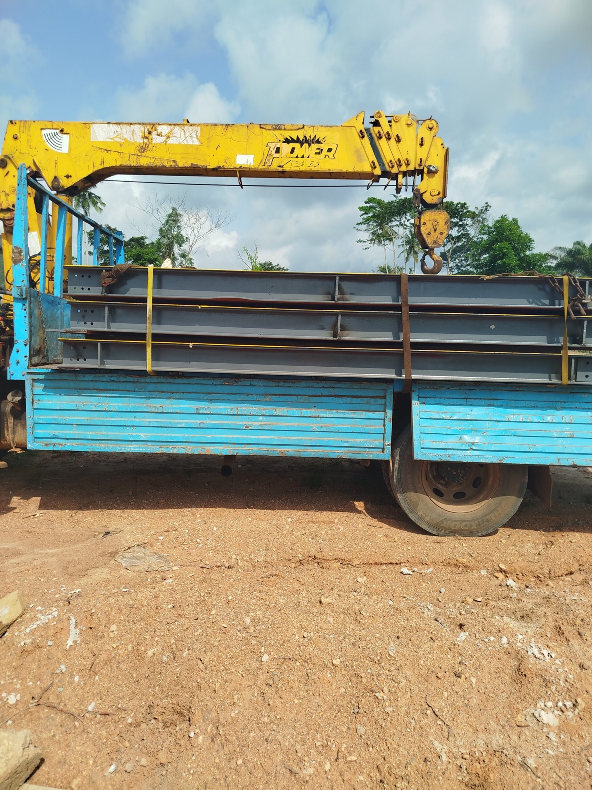 Truck transporting steel weighbridge beams