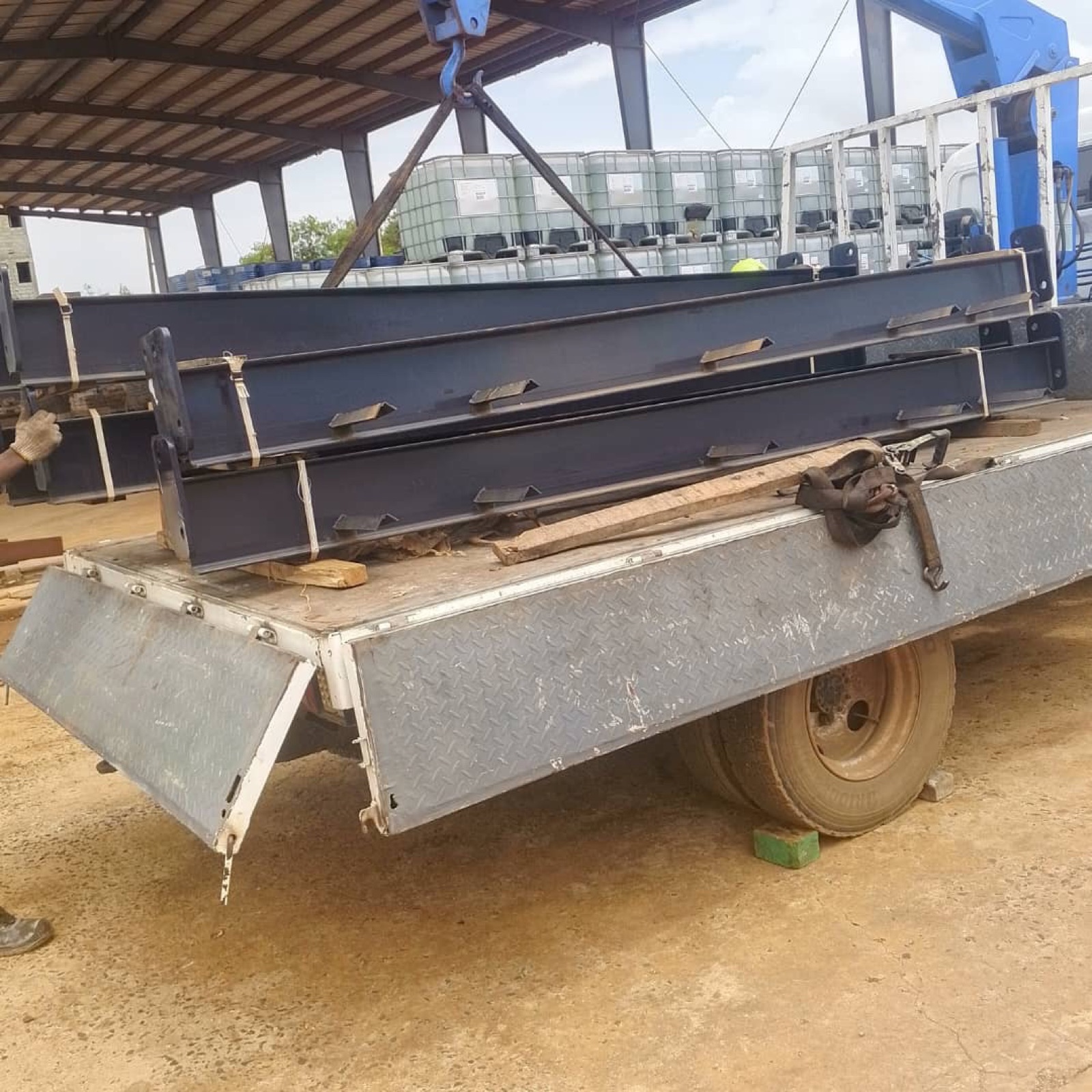 Steel beams delivered to an industrial site