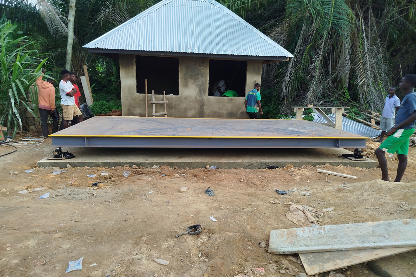 Crane truck delivering a weighbridge deck