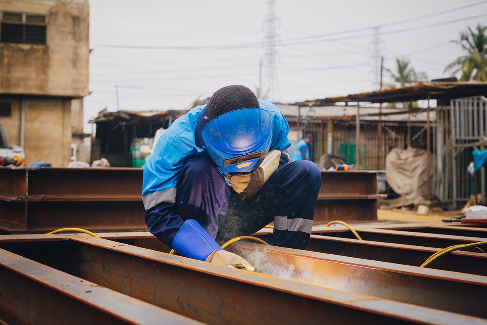 EMESS technician welding a weighbridge deck